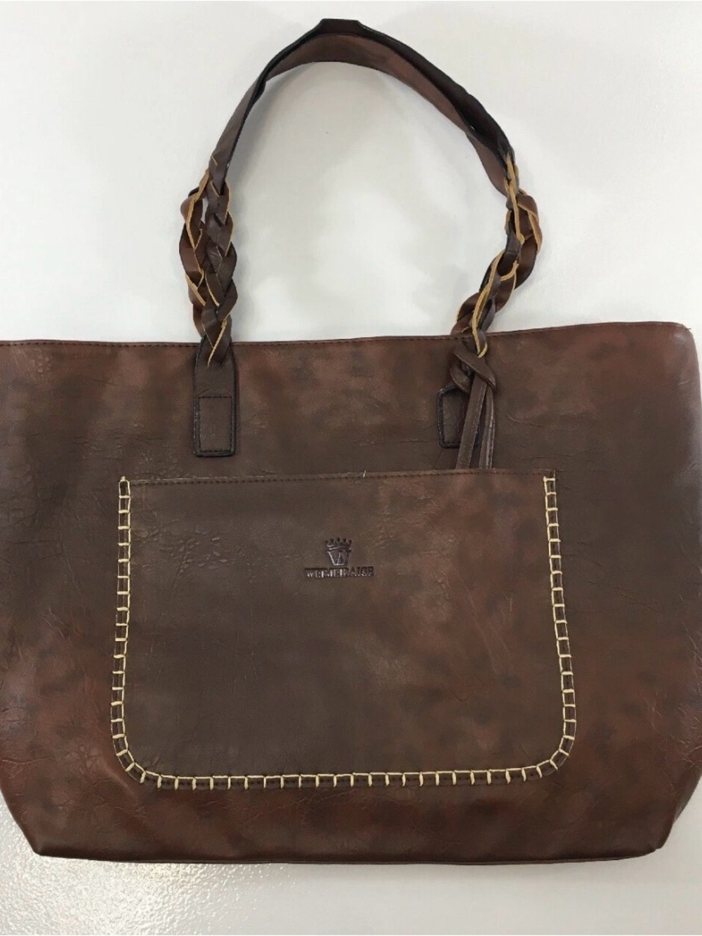 Weimeibaige brand coffee brown faux leather tote bag with braided handles.